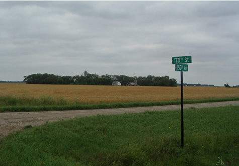 Photos of farm with street sign in the foreground  - 170th st and 152nd ave