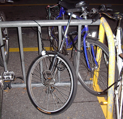 Photo of unicycle locked up at bike rack