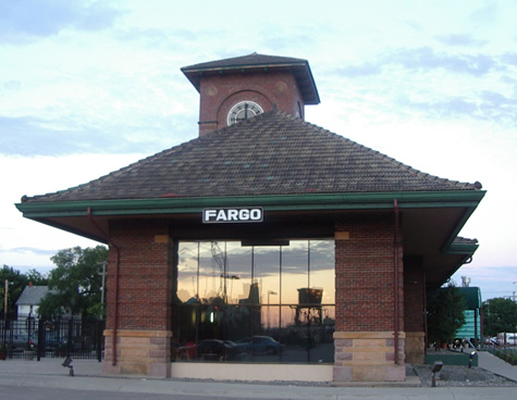 Photo of Fargo Depot with sunset reflected in window